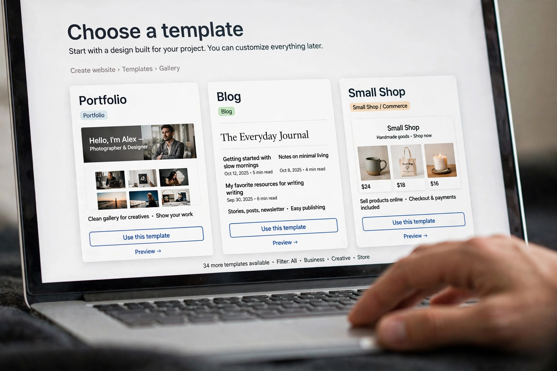 Laptop screen showing a gallery of free website templates for a portfolio, blog and small shop
