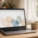 Laptop in a bright home office showing a clean, simple presentation slide